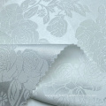 Tissu en satin jacquard blanc floral de polyester spandex tissé blanc